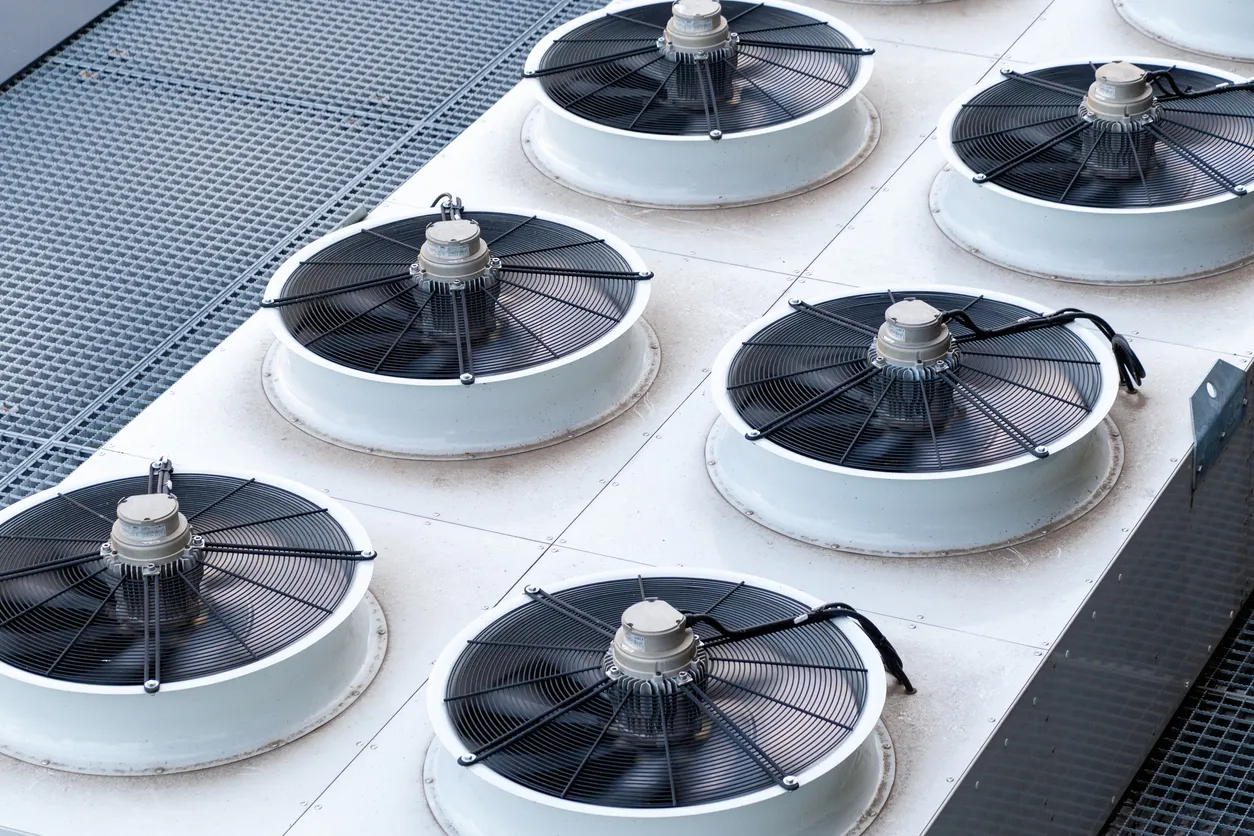 Industrial refrigeration unit on the roof of a building. Chiller.