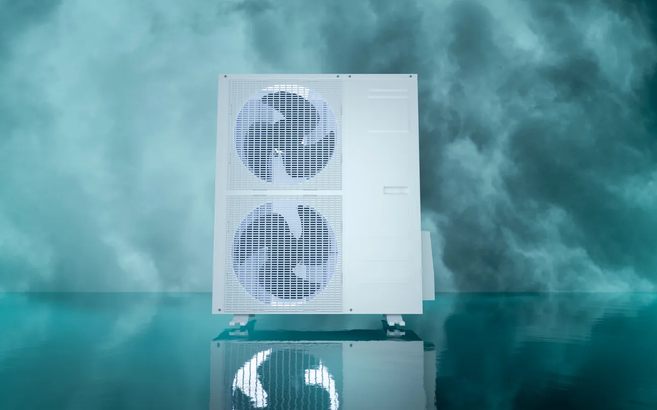 Un gran aire acondicionado externo de dos ventiladores